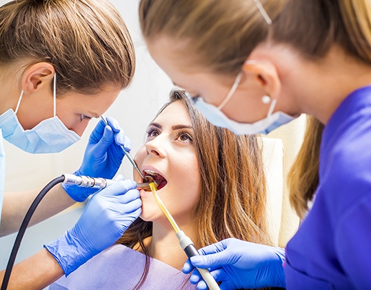 Teenage patient having a filling put in place