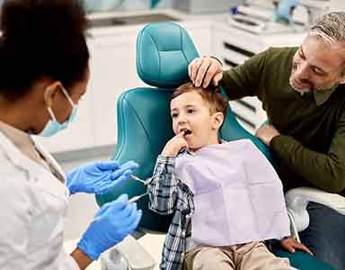 Father and son at the dentist’s office 