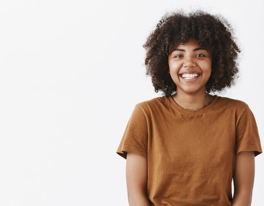 Teen in Castle Rock smiling after teeth whitening