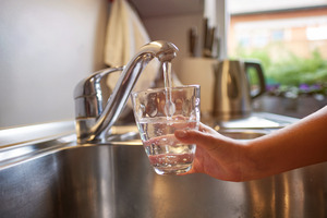 Filling up a glass with water